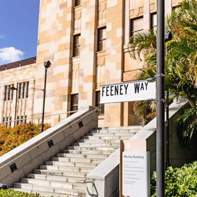 Feeney Way sign in front of building